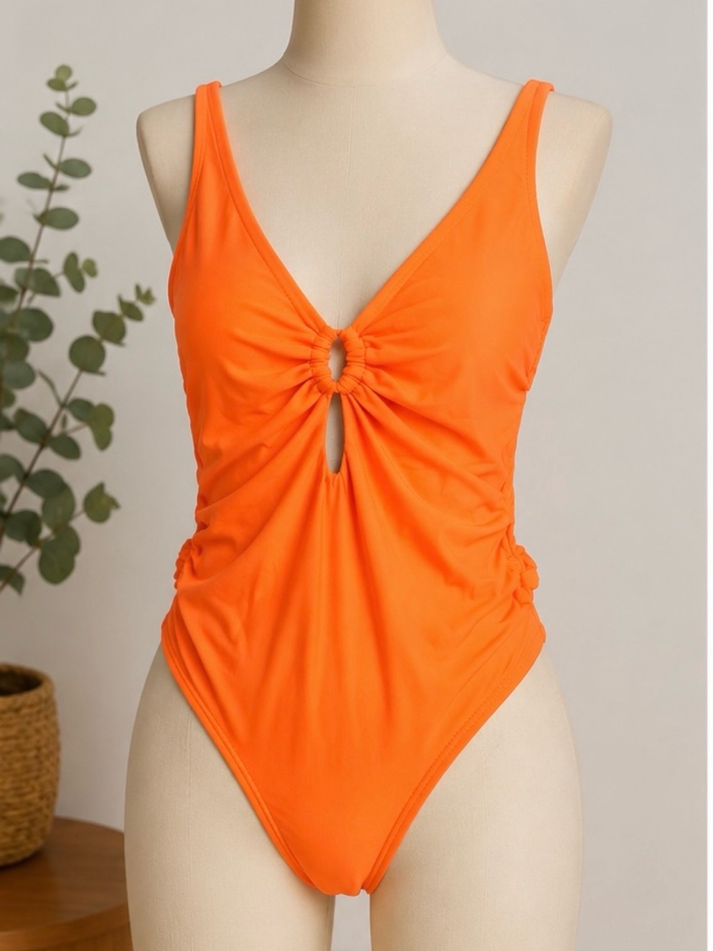 BECCA Bright Orange One-Piece Swimsuit with Ring Detail